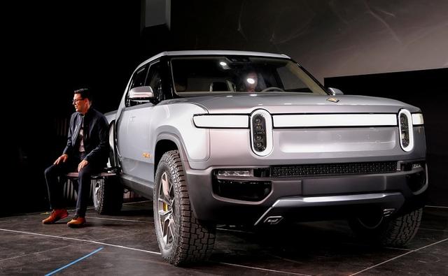 Rivian says it will be delivering more than 1,000 vehicles by the end of the year including the R1T, R1S and the Amazon EDV