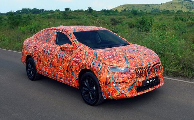 The test mules of the upcoming Skoda Slavia will no more be seen in boring black and white camouflages in India, but in a mixture of Indian motifs.