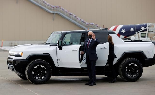U.S. President Joe Biden climbed behind the wheel of an electric Hummer SUV on Wednesday and sped off with a screeching of tires, in a test drive to tout billions of dollars in electric vehicle investment.