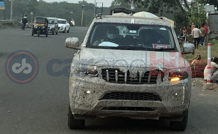 A heavily camouflaged test mule of the upcoming Mahindra Scorpio was spotted by carandbike undergoing on-road testing. The SUV is expected to be launched in the country by early 2022.