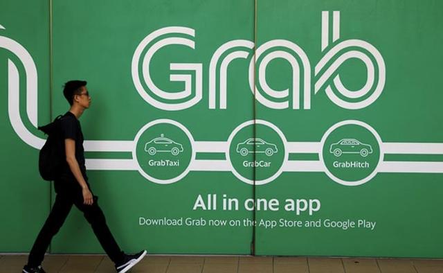 Two top executives at Grab Holdings' fintech business have quit, adding to other senior departures in recent months, as the Southeast Asian ride-hailing and delivery firm rejigs the key unit at the loss-making group, two sources said.