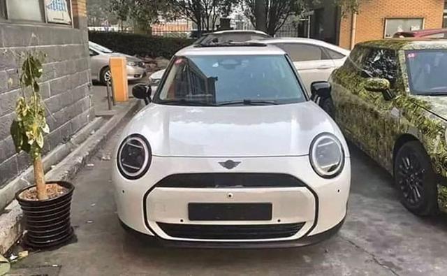 These images have been doing rounds on the internet for the last couple of days and beside the white MINI EV, you can also see the prototype test mule wrapped in camouflage.