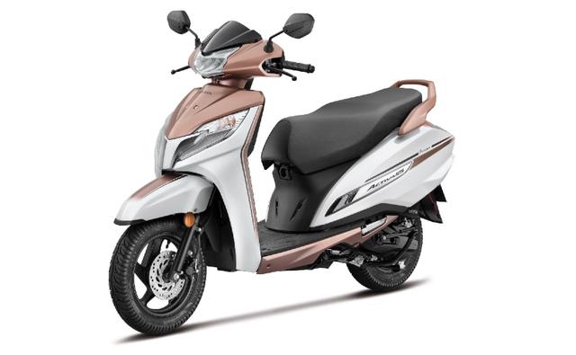 The Honda Activa 125 Premium Edition comes in dual-tone colours and blacked out engine and suspension. There are no mechanical changes.