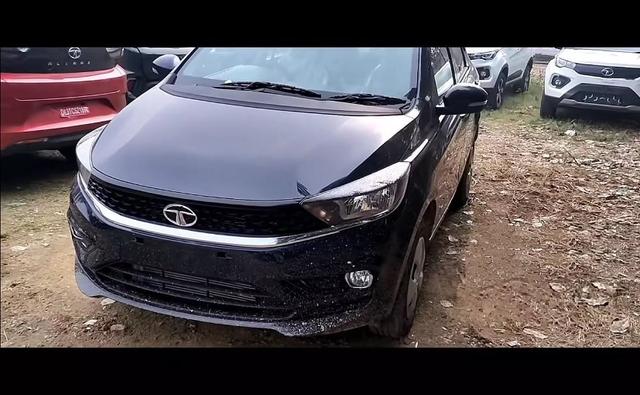 The upcoming CNG-powered Tata Tigor has been spotted completely undisguised at a dealership stockyard, indicating that the company has commenced despatches of the car.