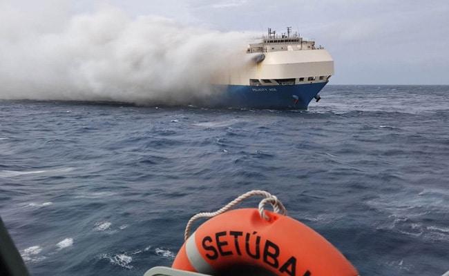 The Felicity Ace, carrying around 4,000 vehicles including Porsches, Audis and Bentleys, some electric with lithium-ion batteries, caught fire in the middle of the Atlantic Ocean on Wednesday.