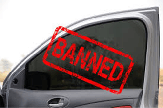 Tinted glass is used on cars to block the sunlight from entering the interiors.In India, there is a law governing the use of tinted glasses. You don't get a new car fitted with tinted glass.