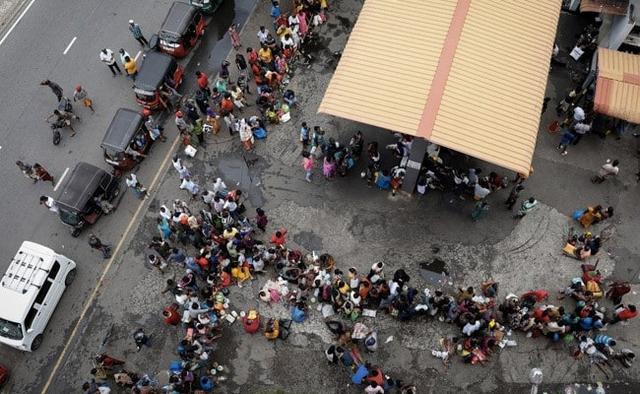 Lines formed in many parts of Colombo, a city of around 900,000 people, as residents tried to stock up on fuel, which is mostly imported and is in extremely short supply
