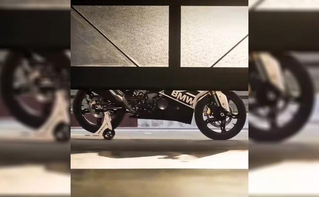 The teaser shows the lower profile of the BMW motorcycle including the alloy wheel design, new BMW graphics and a revised engine casing.