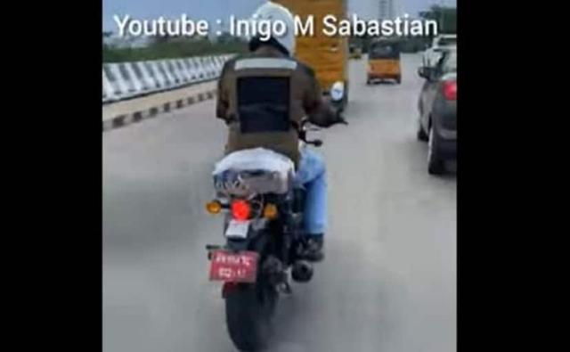 मोटरसाइकिल के छोटे वीडियो में इसे पीछे की सीट पर परीक्षण उपकरण के साथ सड़क पर दिखाया गया है.