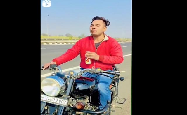 चलती बाइक पर बिना हेलमेट के रील बनाते युवक का वीडियो वायरल, पुलिन ने काटा Rs. 31,000 का चालान