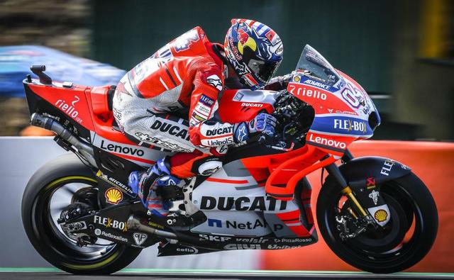 Ducati's Andrea Dovizioso will be starting the 2018 MotoGP Czech Grand Prix on pole tomorrow, ahead of Yamaha's Valentino Rossi and Honda rider Marc Marquez who will start in the front row. The Ducati rider managed to secure his first pole since the Malaysian GP in 2016 and managed to beat Rossi's time by 0.267s with a flying lap of 1m54.689s at Brno. Dovizioso was riding the latest-spec aero fairing on his Ducati and pushed from eighth to top spot beating Marquez.