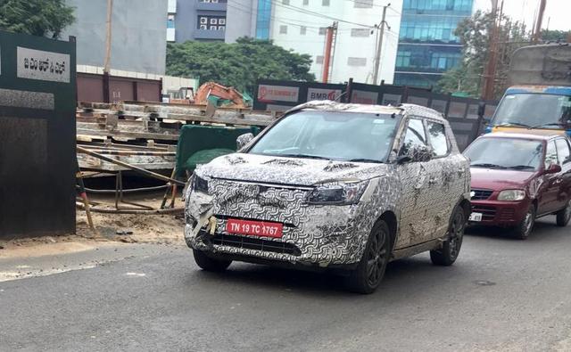 A near-production prototype of Mahindra's upcoming subcompact SUV, codenamed S201, was spotted testing in India. Based on the SsangYong Tivoli, the new sub-4 metre SUV was seen sporting production parts, and this time around we finally get a clear look at the front section of the SUV, especially the new headlamps.