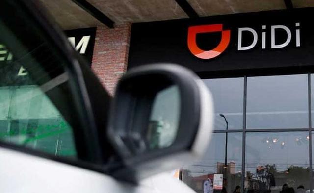Chinese ride-hailing giant Didi Chuxing plans to start using self-driving vehicles to pick up passengers in a district of Shanghai city in a pilot scheme, a senior executive said, taking a further step towards commercialising self-driving technology.