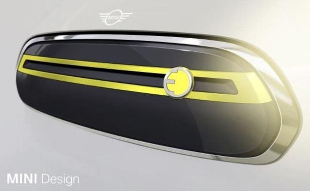 MINI has released a pair of exclusive detail design sketches as an initial preview of its first fully-electric model. The first one is of the new grille, while the second one is of the new alloy wheels.