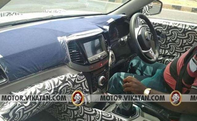 A prototype model of the Mahindra S201 SUV was spotted testing, and this time around the images that have surfaced online give us a closer look at the cabin as well. This is the first time that the interior of the S201 has been spied, and judging by the looks of it, the all-new subcompact SUV will come with a pretty decked-up cabin.