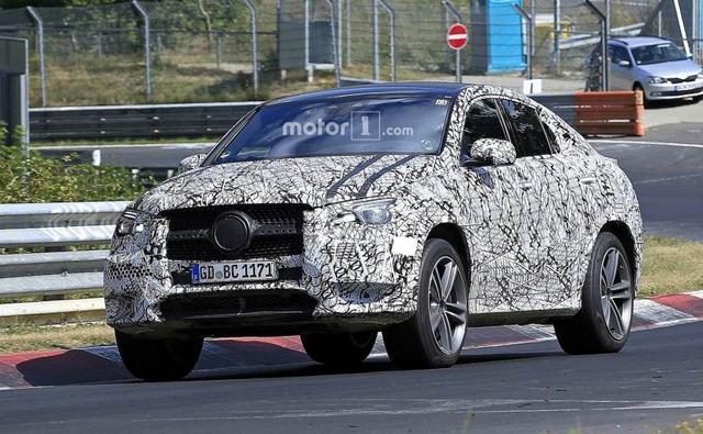 the next-gen Mercedes-Benz GLE Coupe was recently spotted doing test laps at the Nurburgring Circuit. Though heavily camouflaged, the coupe-SUV appears to be nearing its production stage, and we can see a bunch of production-ready parts on the model.