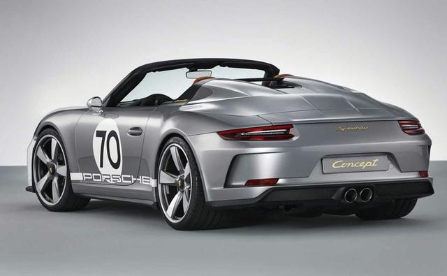 The concept car gets the wide body of the 911 Carrera 4 Cabriolet, although the wings, front bonnet and rear cover of the concept are made of lightweight carbon-fibre composite material. The paintwork in the traditional colours of GT Silver and White harks back to Porsche's early racing cars