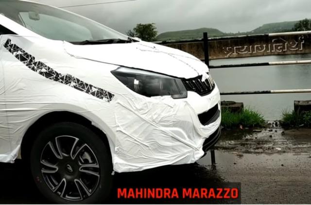 A production-ready version of the Mahindra Marazzo was recently spotted, ahead of the MPV's official launch. Slated to be launched on September 3, the Marazzo is an all-new model from the company and although the MPV is covered in camouflage, the exposed bits reveal its production-ready status.
