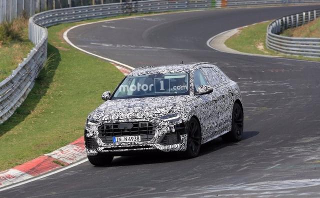 The upcoming Audi Q8 has been recently spotted testing at the Nurburgring Circuit doing some power laps. Though the car is completely covered in camouflage, the silhouette and the profile of the test mule does reveal the true identity of the upcoming coupe-SUV.