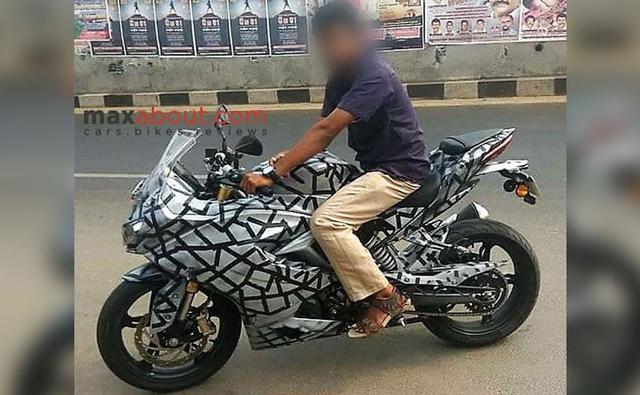 A camouflaged test mule of the upcoming TVS Apache RR 310S has been spotted, revealing features of the near-production model