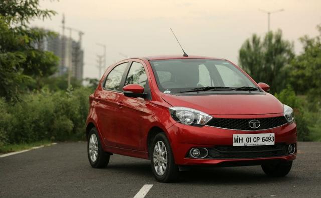 the Tiago went on to win the 2017 NDTV Hatchback of the Year Award too. The only thing it missed was an automatic gearbox. And now, Tata Motors has launched a new variant of the Tiago which gets an AMT option. Under the hood is a 1.2-litre three cylinder unit that also does duty in the standard manual gearbox equipped car. You get 84 bhp of peak power and 114 Nm of peak torque. The gearbox essentially stays the same, a 5-speed unit on which is mounted the AMT shifter module. The module is mated to a traditional shifter lever, which replaces the manual shifter in the cabin. Just like the unit on the Nano and the Zest, the Tiago also gets an AMT unit with a drive, neutral and reverse mode and a manual mode that allows the driver to shift up or down. The Tiago AMT also gets a sports mode to compliment the AMT unit.