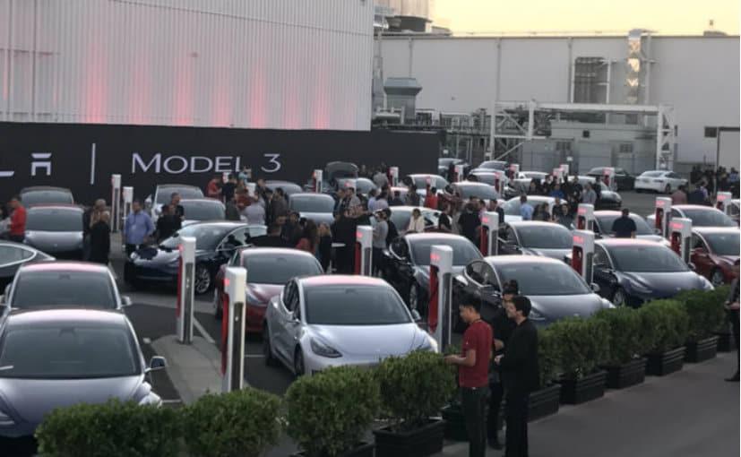 Tesla's Musk Hands Over First Model 3 Electric Cars To Early Buyers