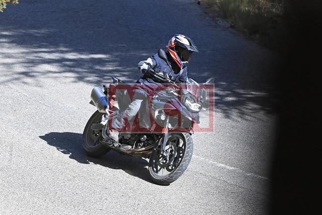 The upcoming BMW F750GS has been spotted testing once again, and this time spy shots reveal a fair bit of details and different variants of the near-production bike