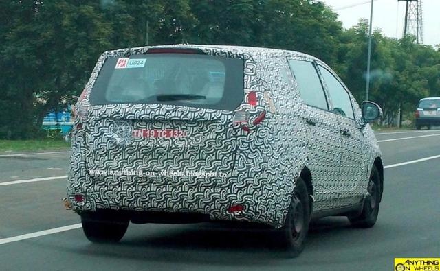 Mahindra U321 MPV has been caught on the camera and this time the car was seen alongside a Toyota Innova Crysta. The upcoming Mahindra U321 MPV will most likely be bigger than Mahindra's existing MPV Xylo and is expected to be launched by the end of 2018.