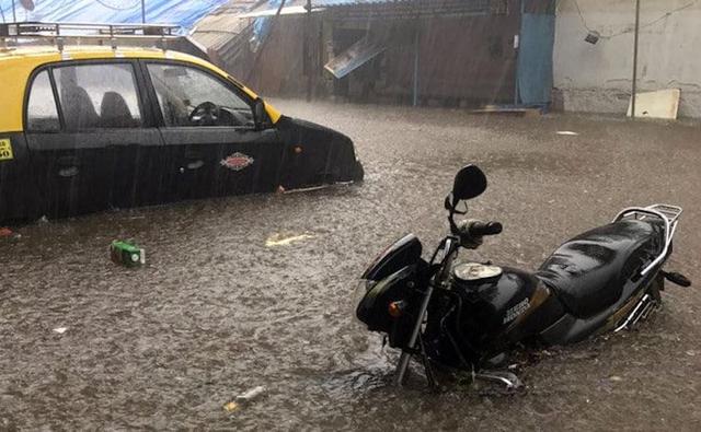 The city of Mumbai is facing one of the worst rains this season and there seems to be no respite coming in the following hours too. If you are lucky enough to be under a roof, bless your Gods; but if you are stuck in a car somewhere in the city, here are some handy tips that you need to keep in mind to avoid damaging your car but more importantly yourself.