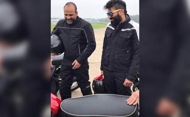 The upcoming Royal Enfield 750 cc motorcycle has been teased in a tweet by Royal Enfield President Rudratej (Rudy) Singh in a tweet. The tweet includes a picture of Singh in riding gear along with Eicher Motors and Royal Enfield CEO Siddhartha Lal at Bruntingthorpe Aerodrome and Proving Ground, a privately owned airport near Bruntingthorpe, Leicestershire in the UK.