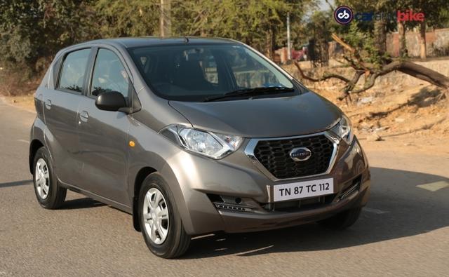 Datsun India has updated its entry-level redi-GO hatchback with additional features for the model year 2019.  The updated redi-GO is priced at a premium of about Rs. 7000 over the current version that starts at Rs. 2.68 lakh (ex-showroom, India). The new model adds both safety and convenience features without any changes to the mechanicals. The 2019 Datsun redi-GO gets ABS across all variants, while the driver side airbag is offered only on the range-topping trim. Expect the driver side airbag to be made standard soon though, while features like seatbelt reminder, high-speed warning and rear parking sensors could be added soon.