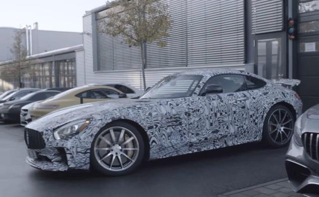 Mercedes-AMG recently teased a new GT model in its latest company video, which could be a sportier, hardcore version of the AMG GT R. The test mule shares a bit of design similarities with the AMG GT4 race car that was spotted earlier in December 2016.