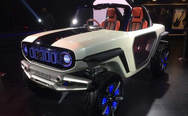 The e-Survivor comes with electrically retractable running boards and features a modern front fascia derived from the Jimny with circular LED headlights and an illuminated five-slot grille.