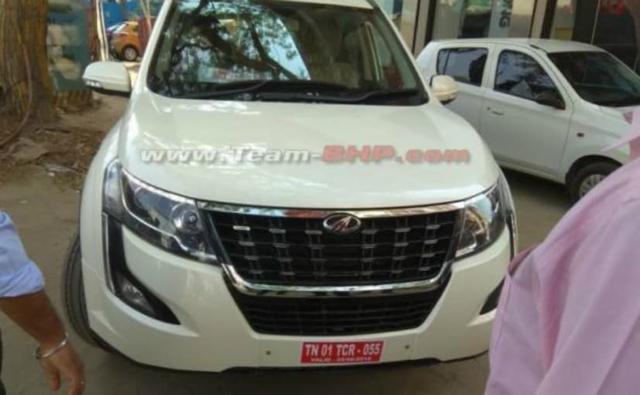 The Mahindra XUV 500 is one of the most popular sub Rs 20 lakh SUV in India. Launched originally in 2011 with a first facelift in 2016, the popular SUV is due for yet another (and major) facelift in order to freshen the range up. The new SUV will be launched soon but has already been spied with minimal camouflage recently. The pictures show the new Mahindra XUV 500 with an updated front and rear end. Updates up front include a new larger front grille that ditches the conventional slats in favour for a sportier look. Thick chrome slats also accent the grille. The signature front bumper slits with the fog lamp housings are now slimmer, slightly more angular and with less chrome as compared to its predecessor.