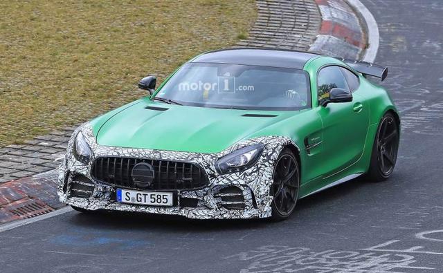 Images of the near production prototype of the updates Mercedes-AMG GT R doing test laps at the Nurburgring have surfaced. The updated models is expected to me more  aerodynamics and possibly a slight boost in power output.