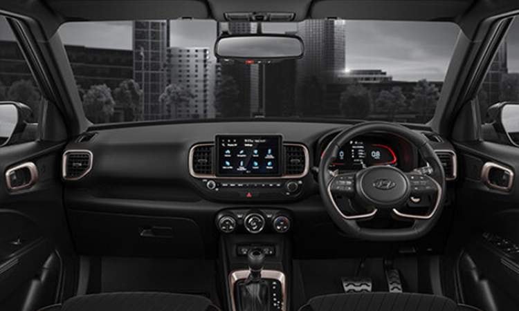 All black interiors with brass coloured inserts All black interiors with brass coloured inserts