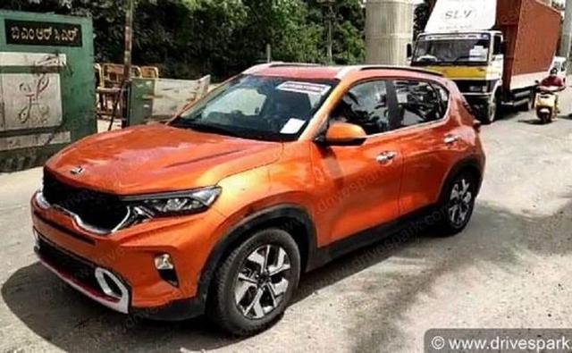 New spy photos of the Kia Sonet have surfaced online, and while we know that the SUV has already been unveiled, these new ones are special. The Kia Sonet in these photos come in a special orange exterior colour, which is not listed on the company's website among its official colours. It's possible this could be a one-off, or a special colour will be introduced at the time of the launch or sometime in the near future.