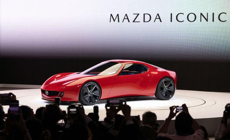 The concept car features a distinctive two-rotor hybrid powertrain, capable of running on various fuels, including hydrogen, and generating electricity from carbon-neutral sources.