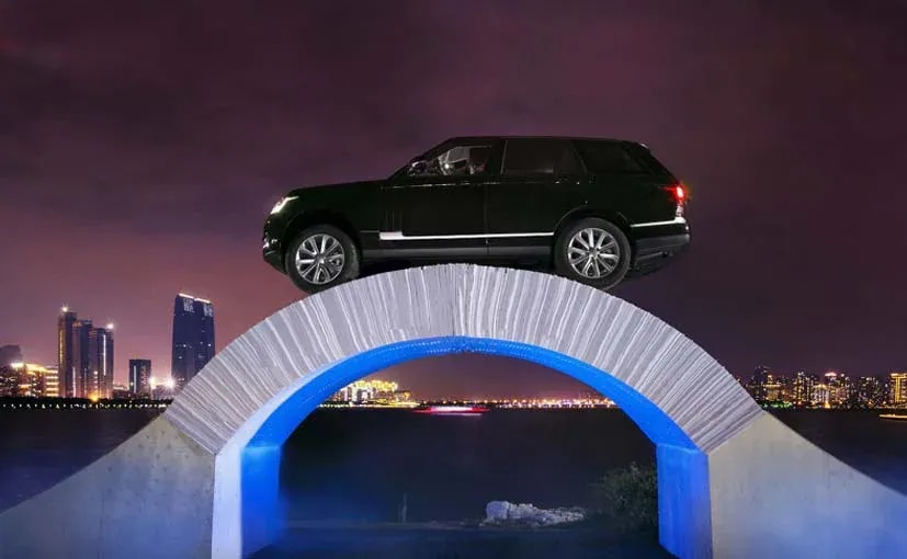 Range Rover Crosses Bridge Built From Paper on 45th Anniversary Range Rover Crosses Bridge Built From Paper on 45th Anniversary