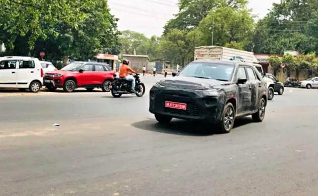 Spy images of the Maruti Suzuki YFG have surfaced online and it's the same model that's being developed by Toyota and will be shared with Maruti Suzuki.