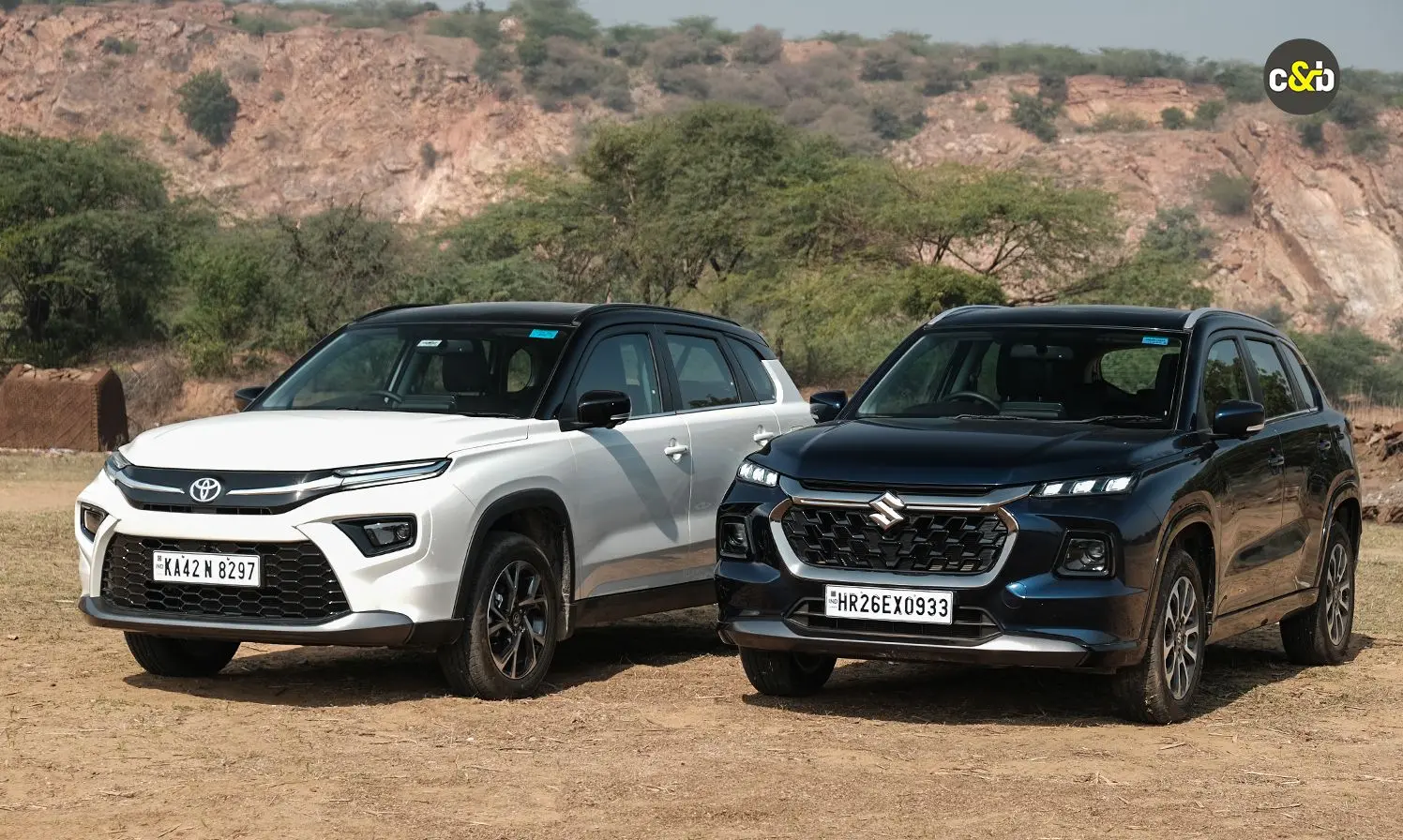 Both the Maruti Suzuki Grand Vitara and the Toyota Urban Cruiser HyRyder share similarities, and significant distinctions, but today we will help you make a more informed decision about which one to buy.