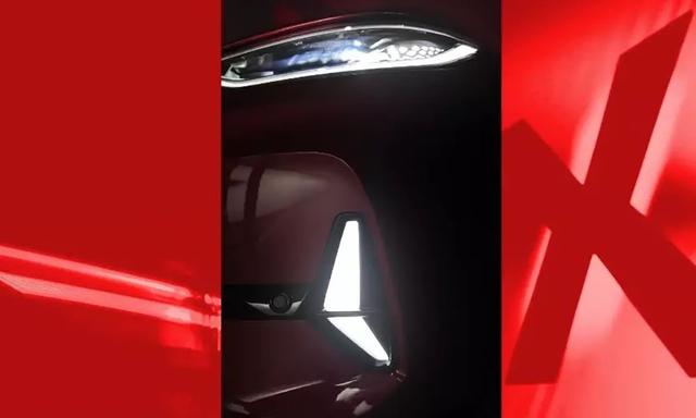 Volkswagen teased sportier electric Kombi: ID. Buzz GTX. The interior features a flat-bottom steering wheel and red accents. Long-wheelbase variant with seven seats and a larger battery is expected soon.