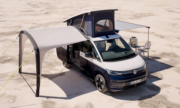 The new Volkswagen California 6.1 is boxy in design with sliding rear doors and packs a kitchenette and a pop-up roof, making it a great option for the outdoorsy folks. 
