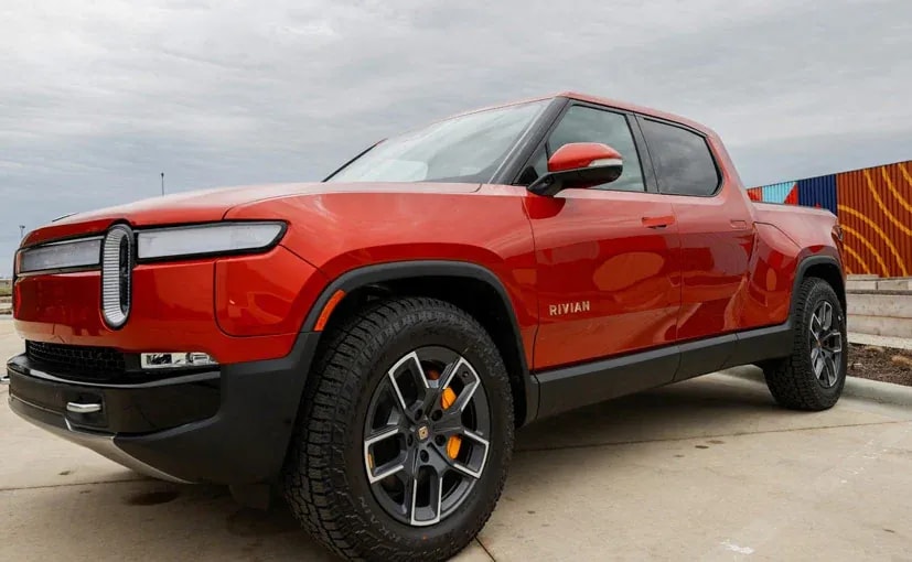 EV Maker Rivian Plans To Cut Hundreds Of Jobs - Bloomberg News EV Maker Rivian Plans To Cut Hundreds Of Jobs - Bloomberg News