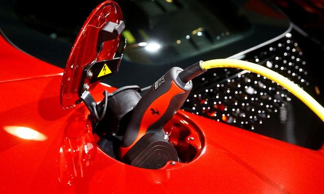 Ferrari makes some of the fastest cars on the road, but the luxury Italian automaker is taking the slow lane to an electric future as it tries to overcome the technology's disadvantages against today's powerful fossil fuel engines.