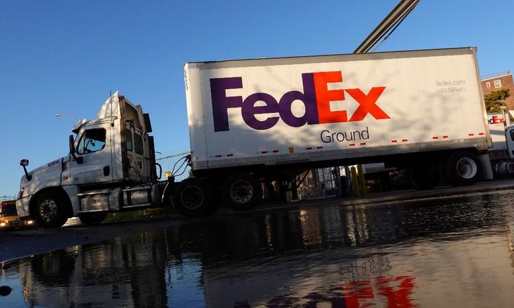 FedEx Office will pilot Ford Motor Co's electric vans to pickup and deliver parcels in some regions, the unit of FedEx Corp said, as part of the delivery giant's move to cut its fleet's tailpipe emissions.