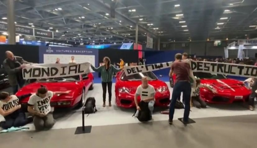 Eco-Activists Storm Paris Motor Show And Vandalise Supercars Including A $180,000 Ferrari Eco-Activists Storm Paris Motor Show And Vandalise Supercars Including A $180,000 Ferrari