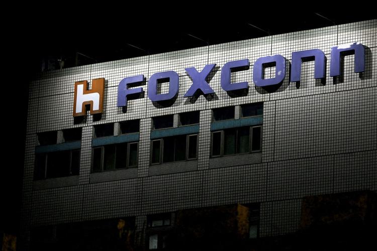 Taiwan fined Foxconn T$10 million ($329,088) for making an unauthorised investment in a Chinese chip firm.