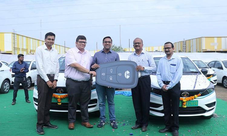 Tata Motors has signed an MoU with Everest Fleet Private Limited for the delivery of 5000 XPRES-T EVs for the latter's cab services. As a part of this contract, 100 cars were handed over to the company.
