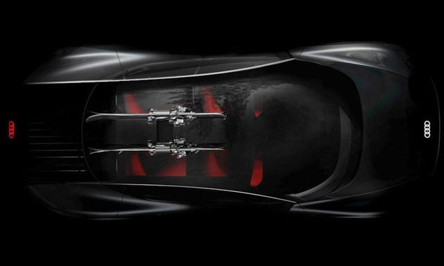 New teaser provides a top-down view of the vehicle revealing new details such as a glass roof, stylised rear deck and red upholstered seats.